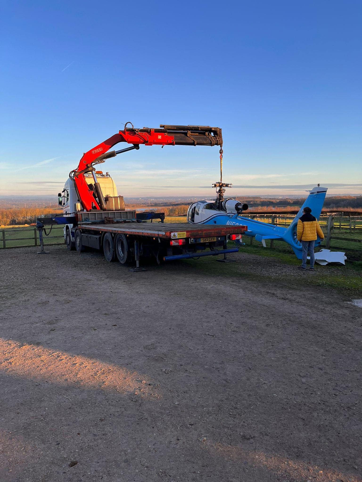 HIAB crane lifting a helicopter load